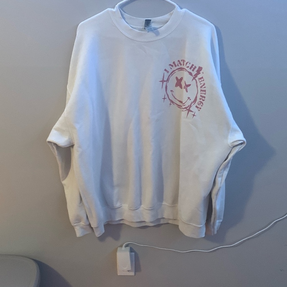 I’m selling a sweater, from a small business. It’s a 2x white sweater